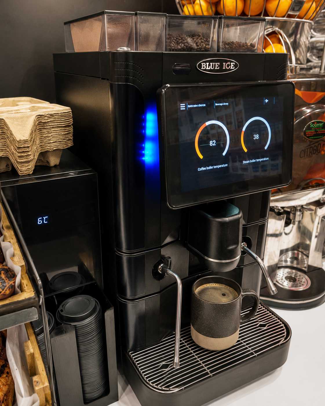 SnackiFry bean-to-cup coffee machine pouring a fresh coffee